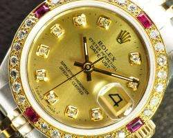 ROLEX LADIES 18K GOLD DATEJUST GOLD DIAMOND AND RUBY WATCH  