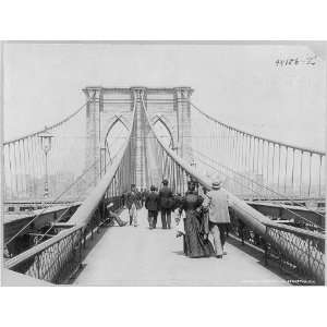  Brooklyn Bridge,NYC,people walking in both directions 