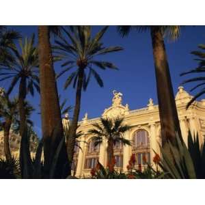 Casino Framed by Flowers and Palm Trees in Monte Carlo, Monaco, Europe 