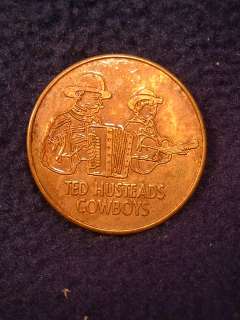 Great vintage trade advertising coin. Ted Husteads Cowboys   Wall Drug 