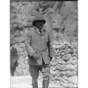 Theodore Roosevelt walking forward,wearing pith helmet,travel,Africa 