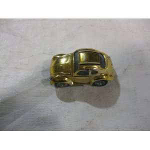  Gold Colored Volkswagon Beetle Friction Car: Toys & Games