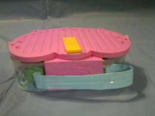This MATTEL 02 FASHION POLLY POCKET POOL SET W/ ACCESSORIES is in 