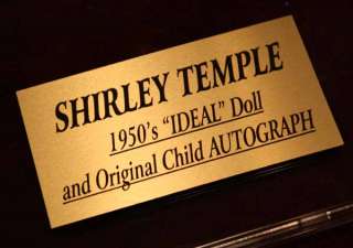 The IDEAL SHIRLEY TEMPLE 12 1957 Doll has a cute white dress with 