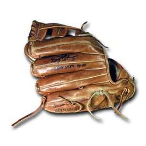 Ricky Gutierrez Autographed Game Used Glove:  Sports 