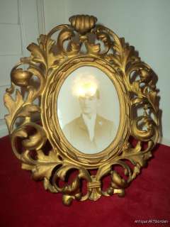 Here is a fancy antique Victorian picture frame, a standing frame 