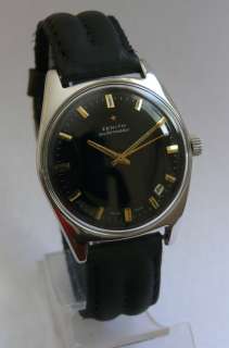   black dial signed zenith automatic swiss golden batons and matching