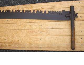 terrific antique crosscut saw Has its 2 original wooden handles 