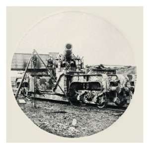  A large camouflaged British rail mounted gun on the 