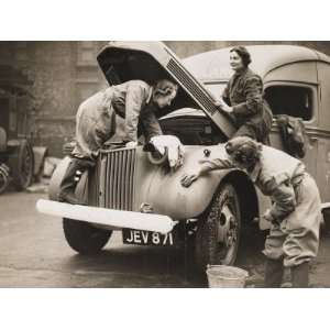  Women Washing an Ambulance as Part of the War Effort 