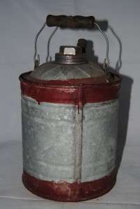   hand made delphos mfg galvanized gas can with wood handle m1873