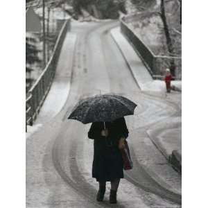  Walking in the Snow with an Umbrella National Geographic Collection 